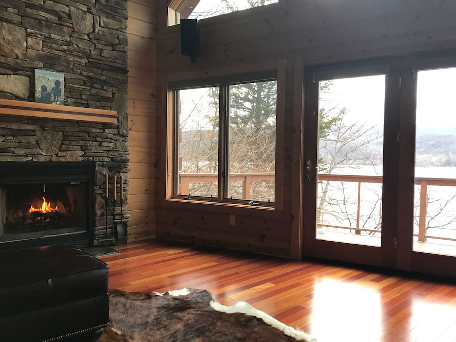 Family room, wood burning fireplace with wrap around views.