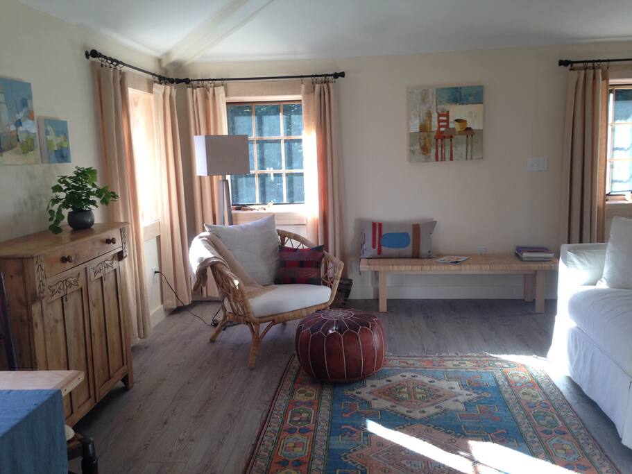 Living room with comfy reading corner.