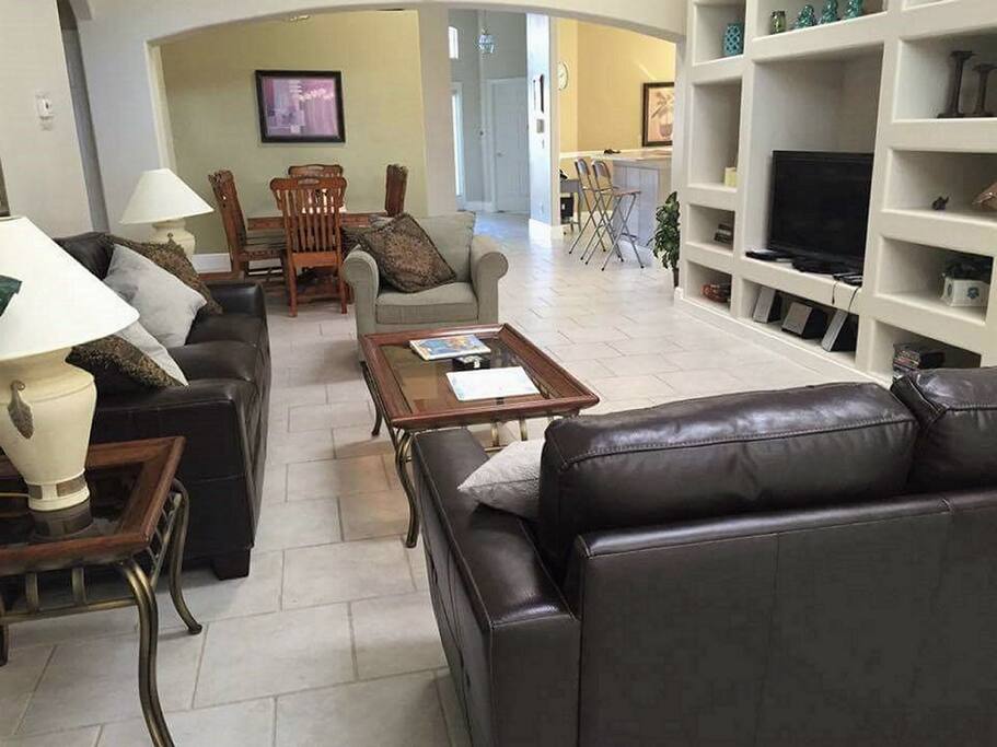 Living room with view of dinning and kitchen area