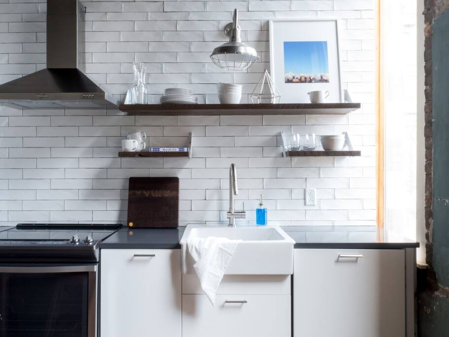 View of fully equipped kitchen