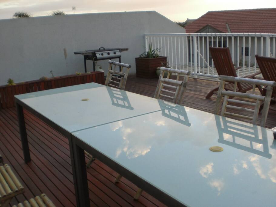 Large rooftop deck with sea views