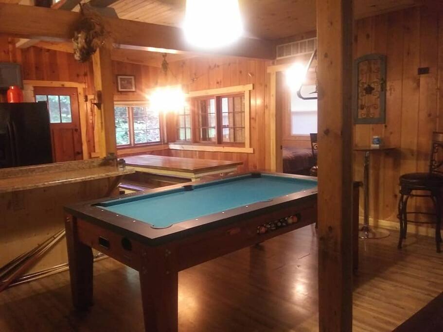 Pool table flips to air hockey, ping pong can be added! 9 foot farm table with bench seating.
