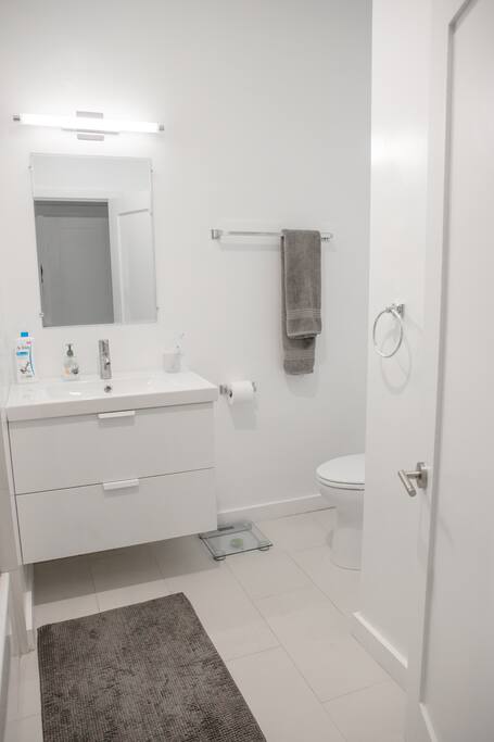 shared full bathroom -- there is a half bath to use in the living room when this is occupied.