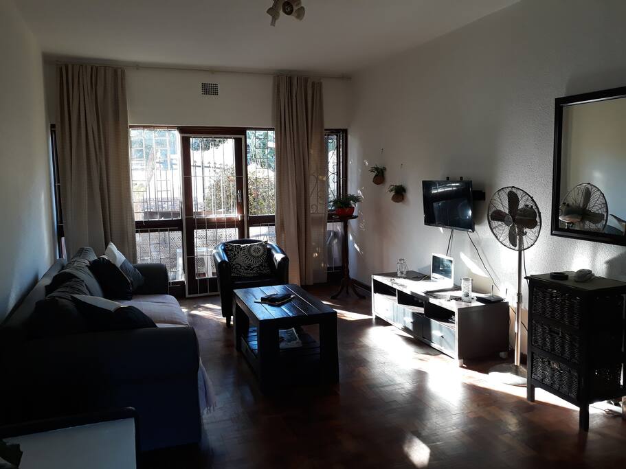 Living room leading onto outside balcony
