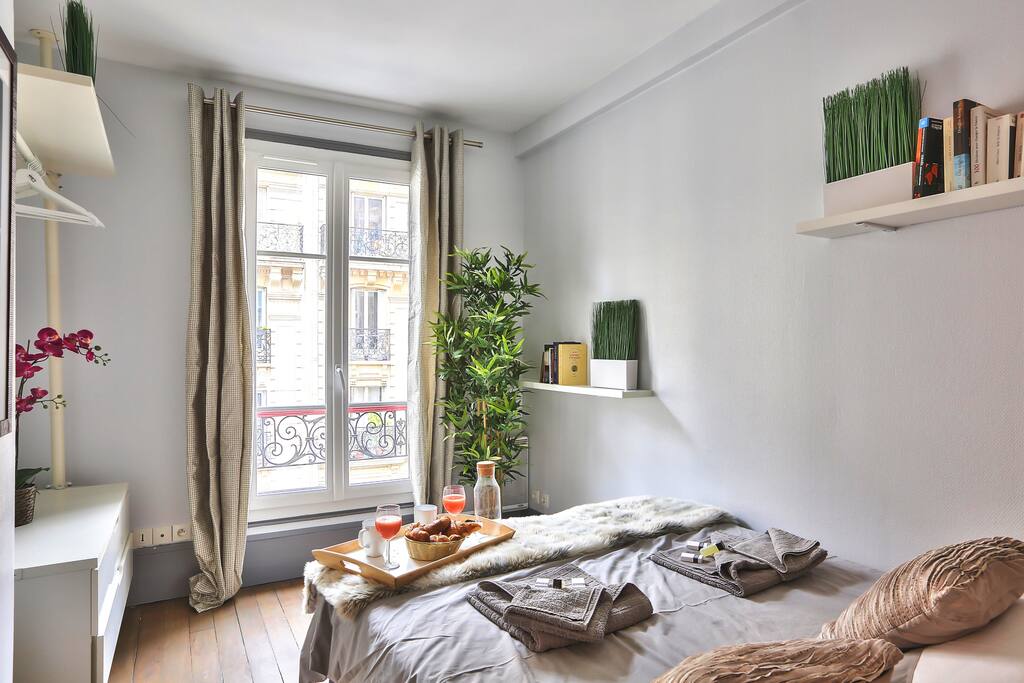 The bedroom is equipped with double-glazed windows
