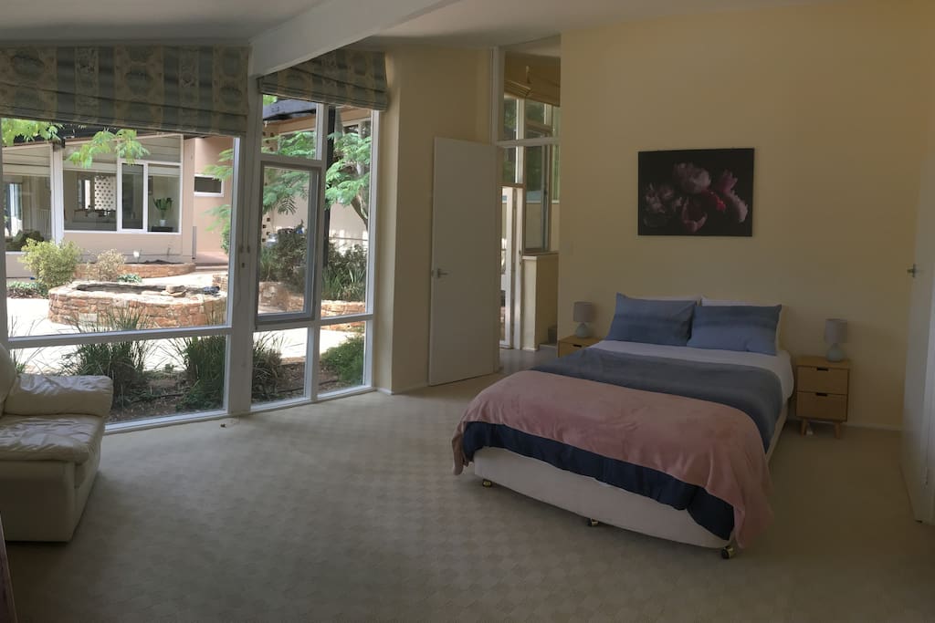 Main master bedroom with queen bed and ensuite