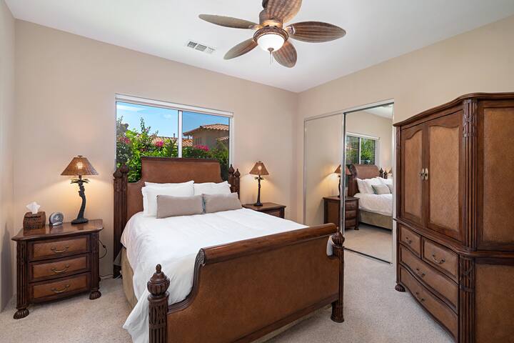 Second Bedroom with Queen sized bed complete ceiling fan and private bathroom