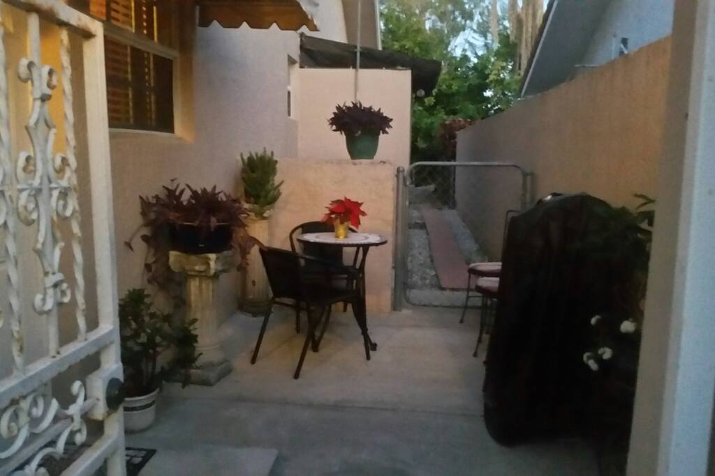Small patio entrance is gated. Leads to your parking space.