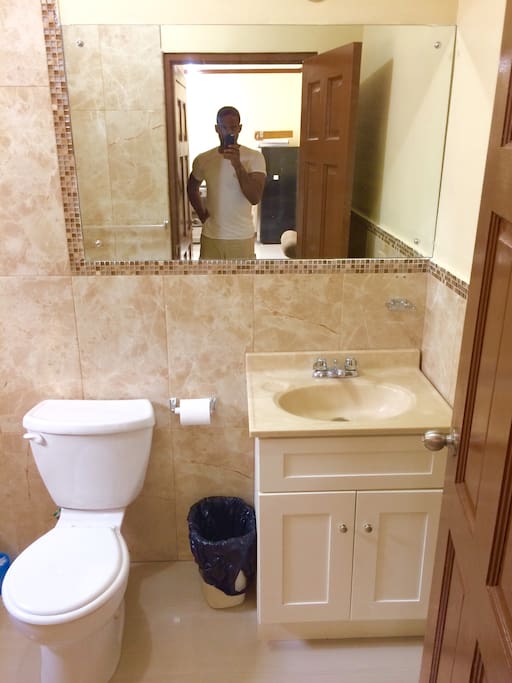 New bathroom, marble floors and walls.