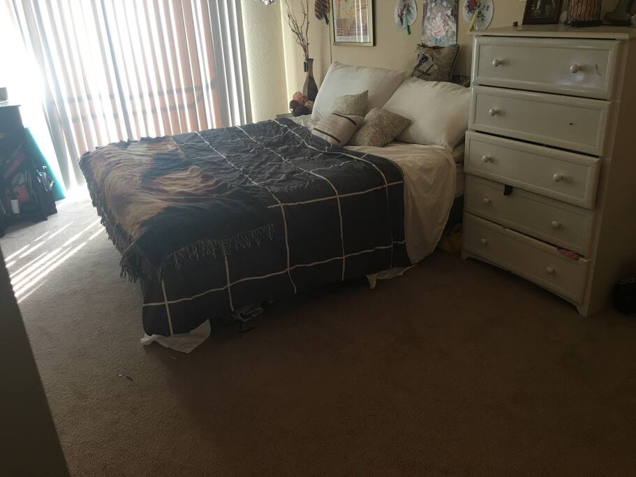 Master bedroom with balcony.