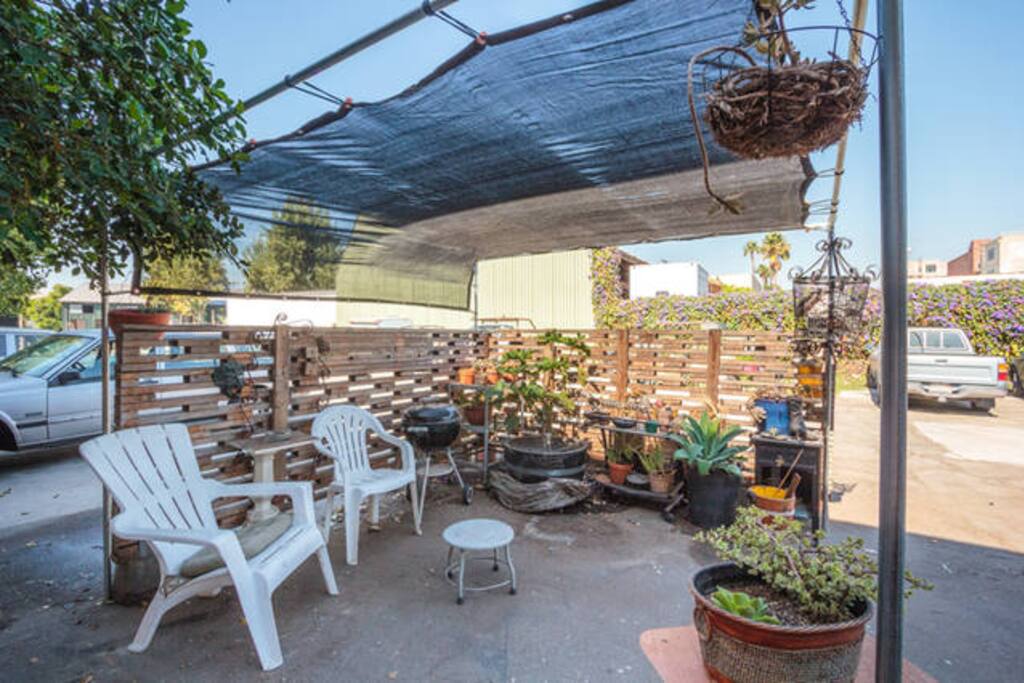 patio garden, with shade & bbq grill.