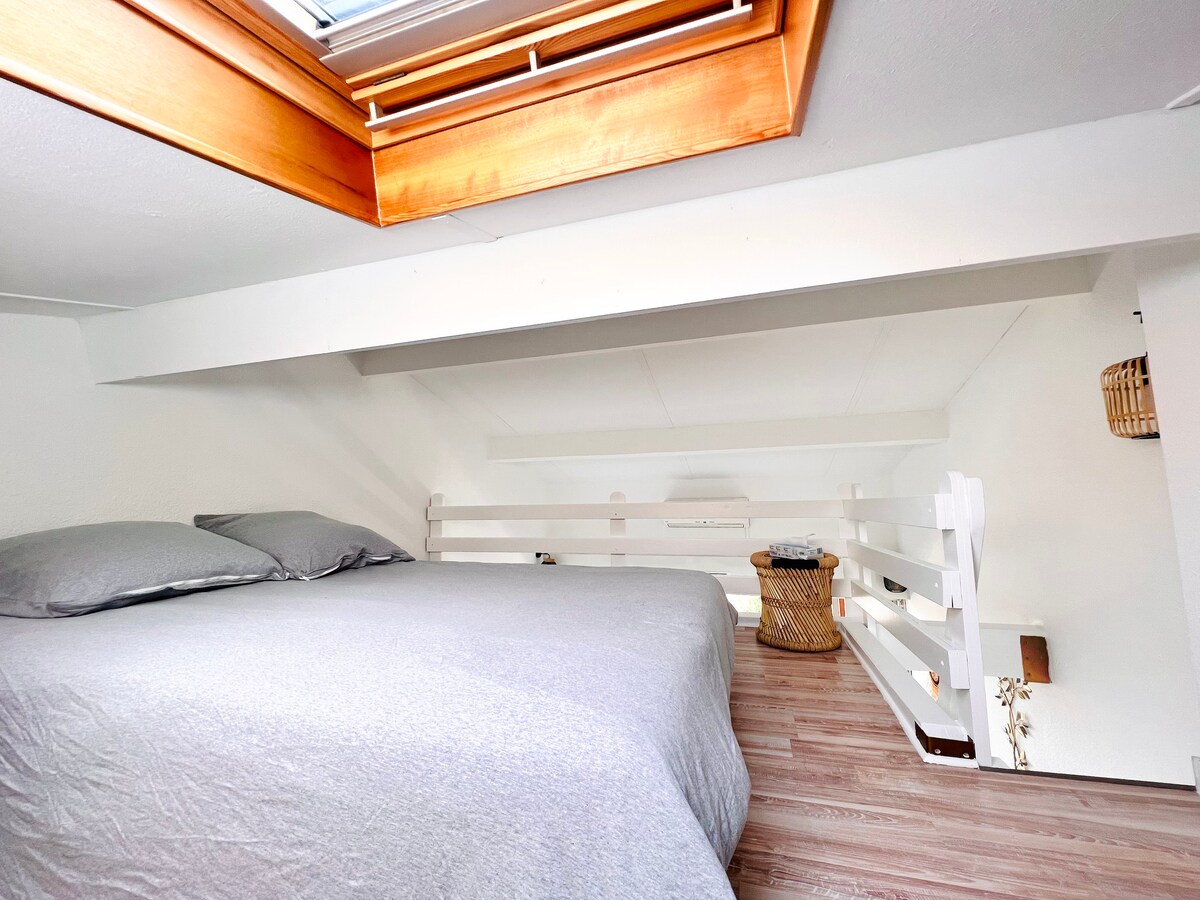 La chambre en mezzanine 