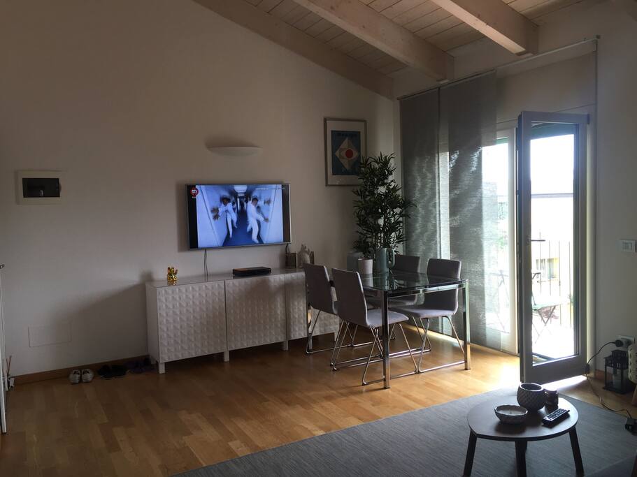 Bright and airy living room with 50 inches plasma TV