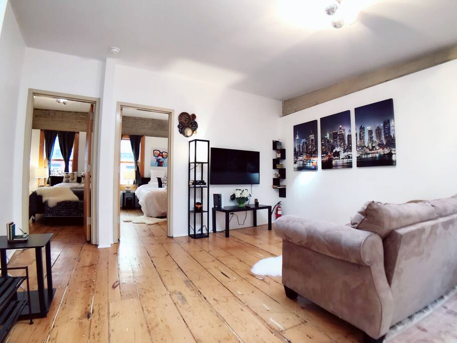 Living Room with 52'' 4K Smart TV Free Netflix and Hulu Access, also Pull out Sofa can sleeps 2 person