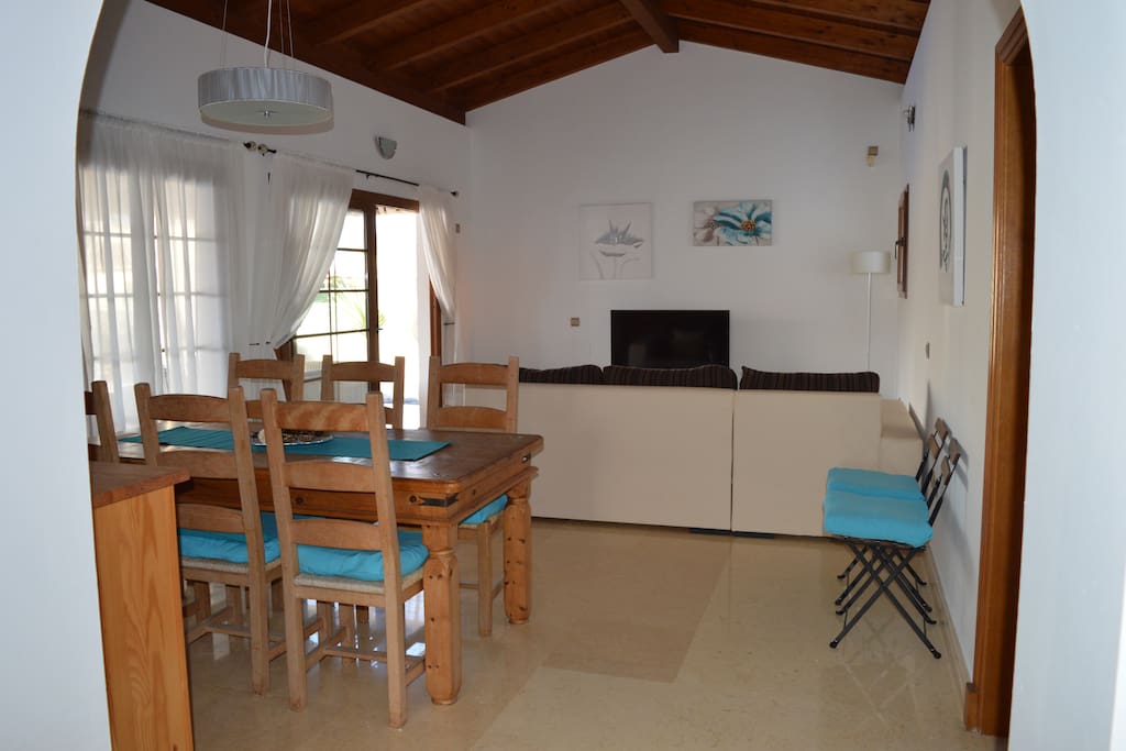 Indoor living and dining areas; free wifi included