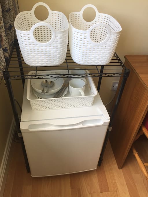 Mini fridge in room.