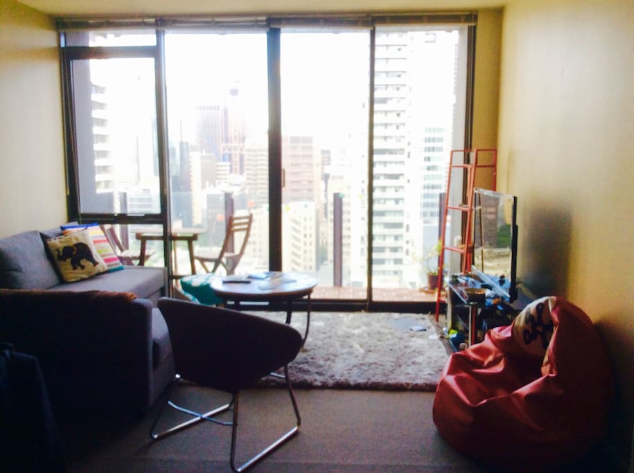 Light filled lounge, with ccess to balcony