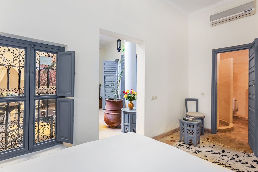Our cosy ground floor Jardin Room opens to the patio and seating area