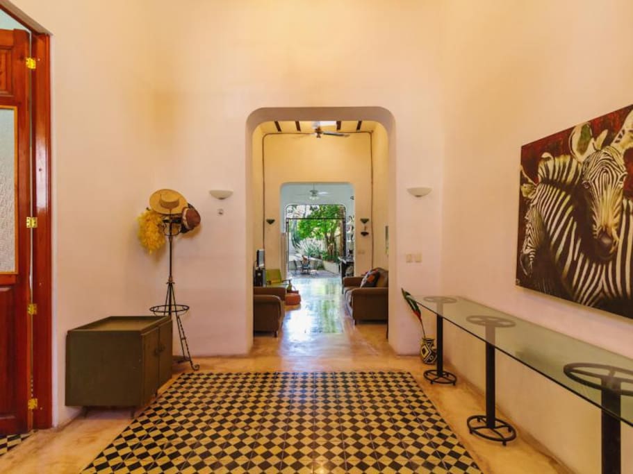 Entry room through to pool.