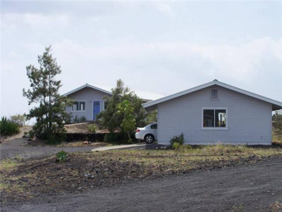 Detached two car garage has a washer, dryer and clothesline.