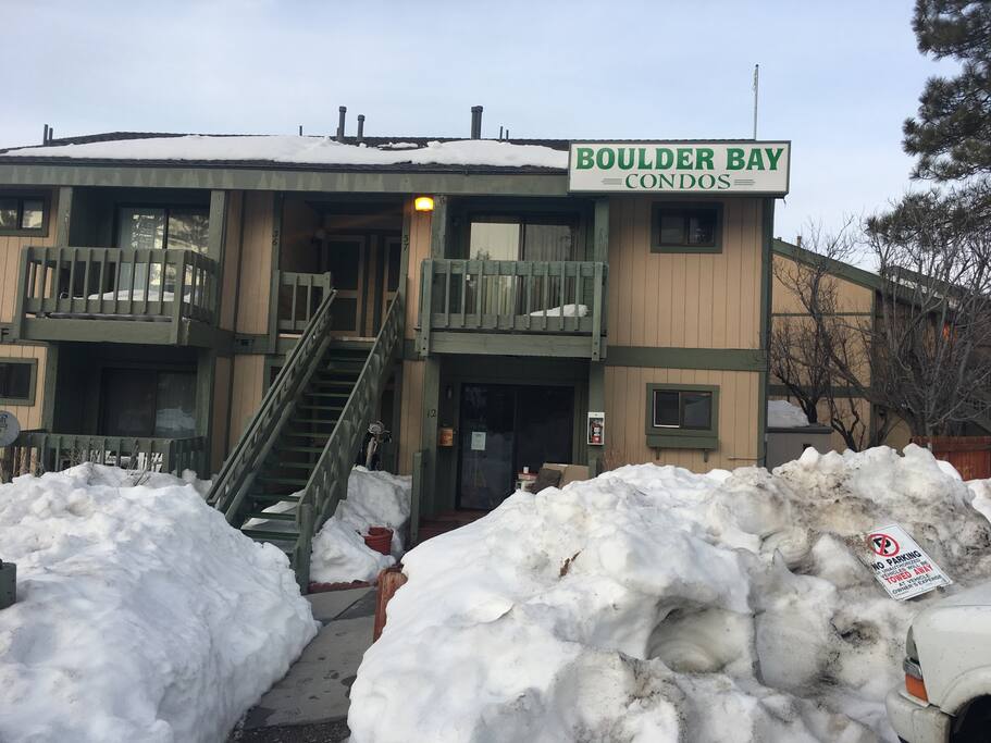 Front entrance, after #12, you will find my condo# 13. Can't park in the front, permit only, but unload stuff is fine. Parking on the blue jay road at the back