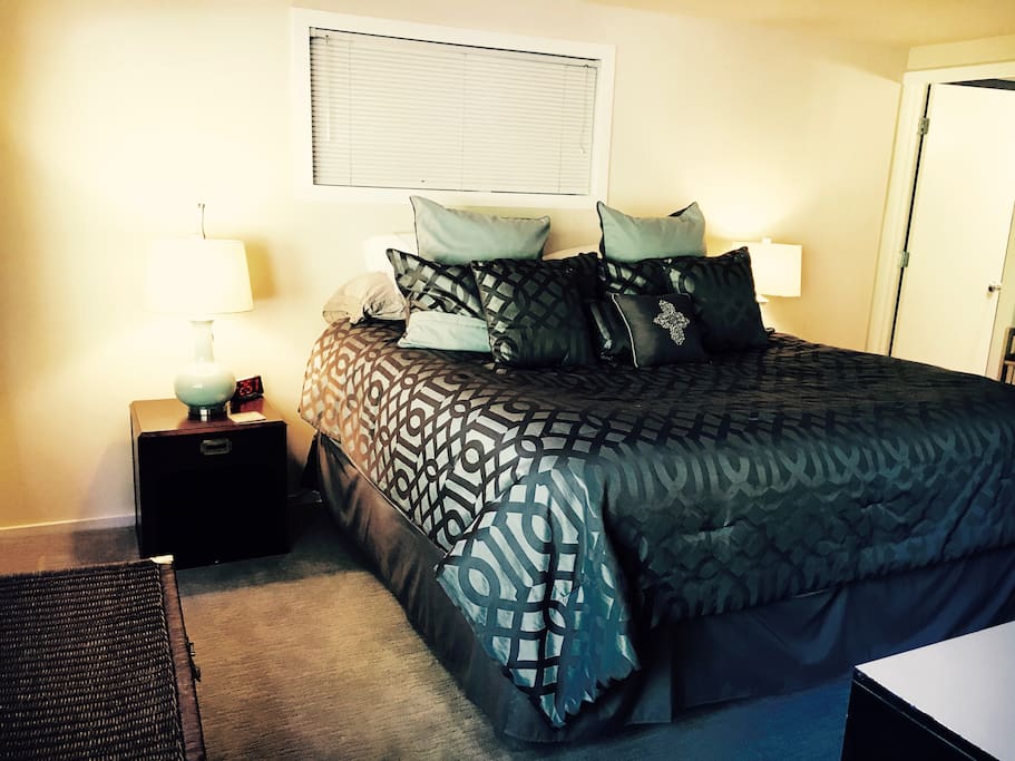 Your comfortable King Bed with designer sheets!