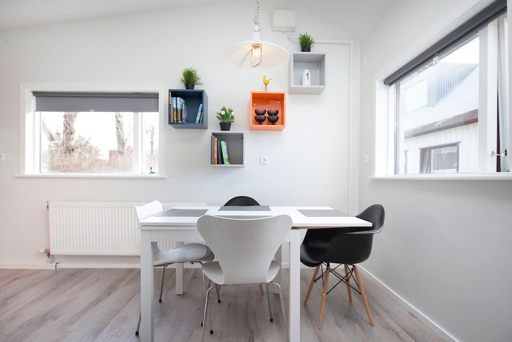 The kitchen and the kitchen table. There are other, brand new chairs now.