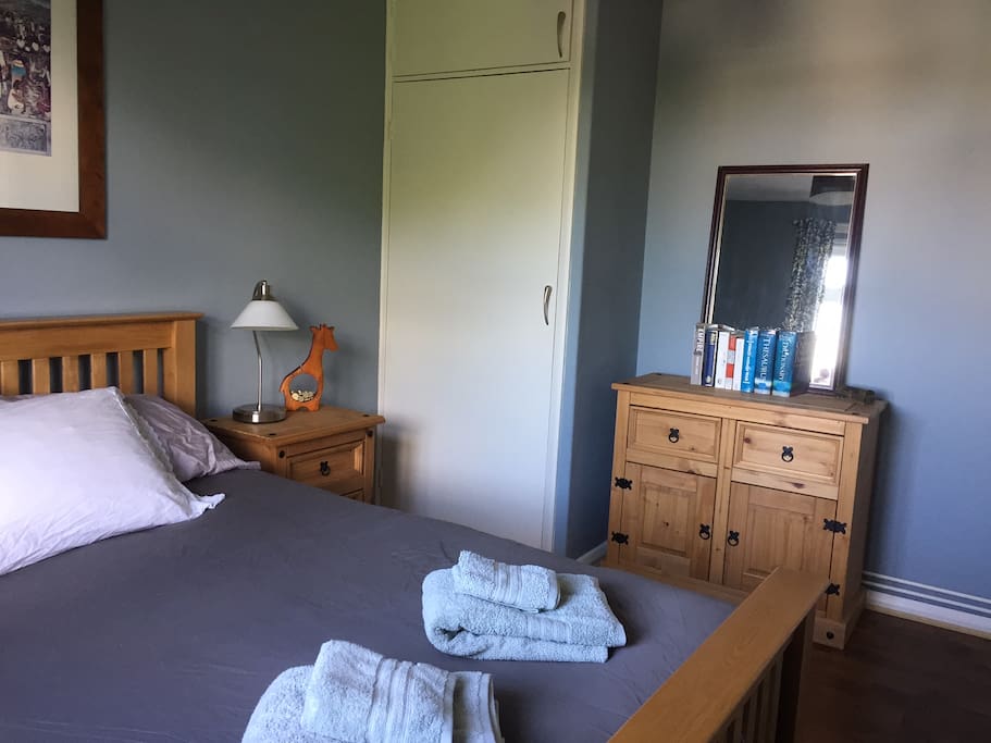 Spacious double bedroom to welcome guests with high quality mattress