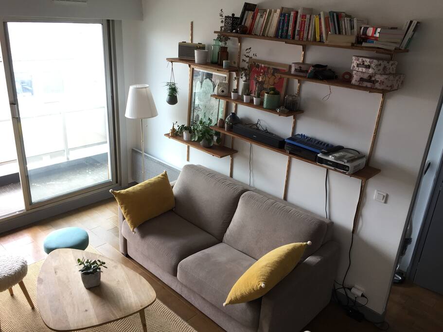 Our homemade shelf and comfy sofa bed