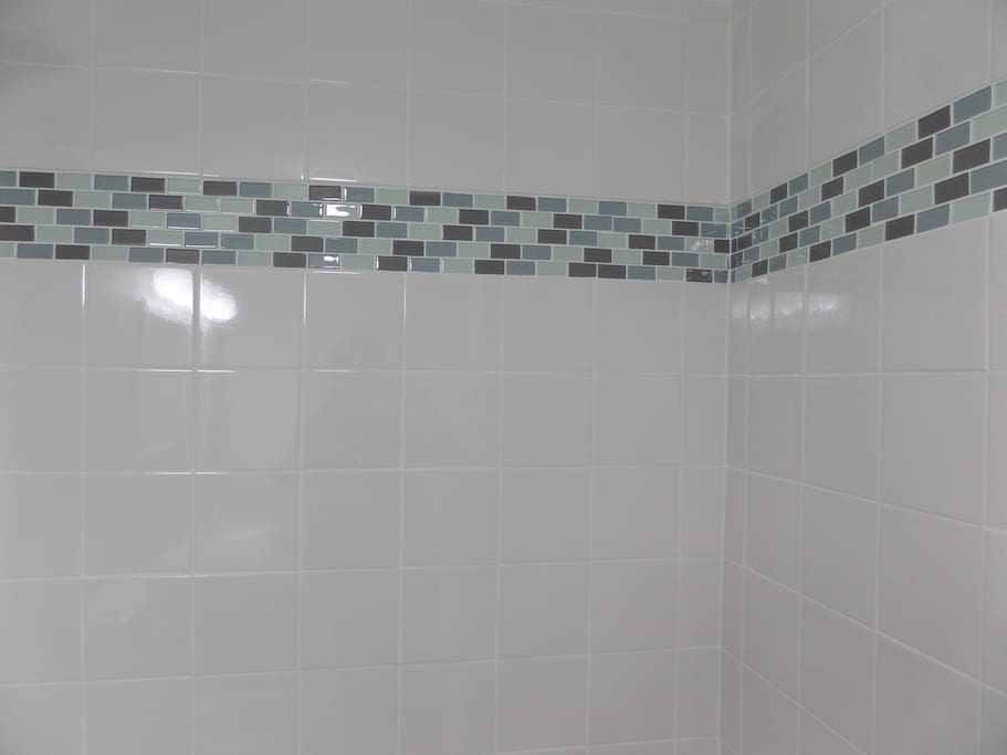 Custom tile work in the tub/shower area