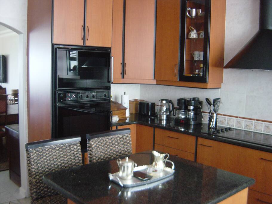 Kitchen with dishwasher dryer and washing machine
