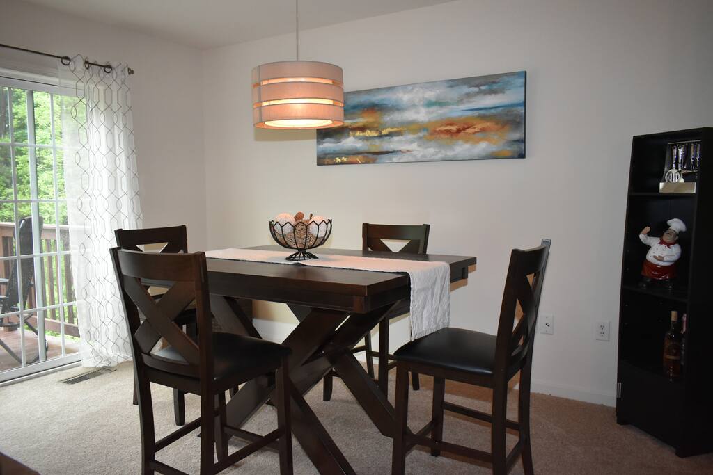 Dining area with fold out leaf. Comfortably fits 6 people