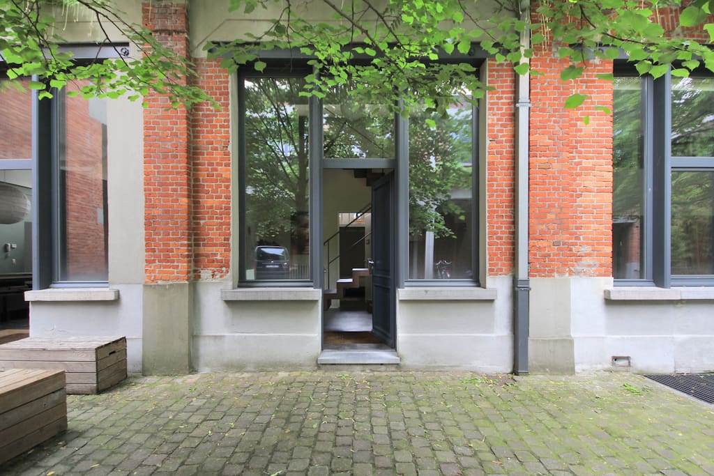 Behind this door, there is the entrance to our room