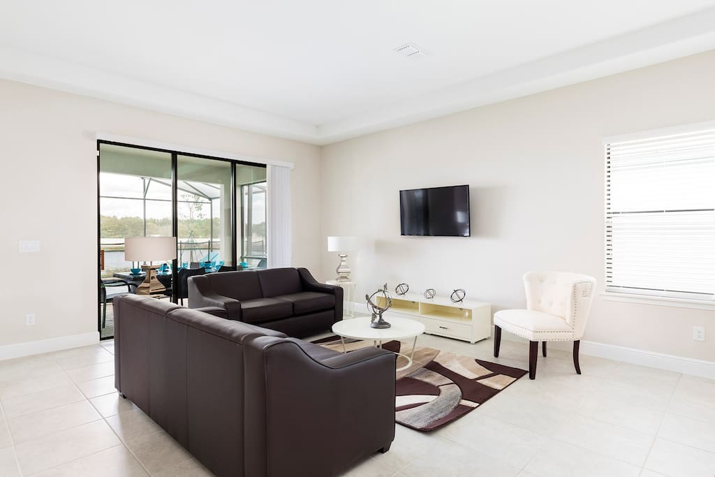 Relax in the cozy living room and catch a Disney movie on the wall-mounted flatscreen TV.