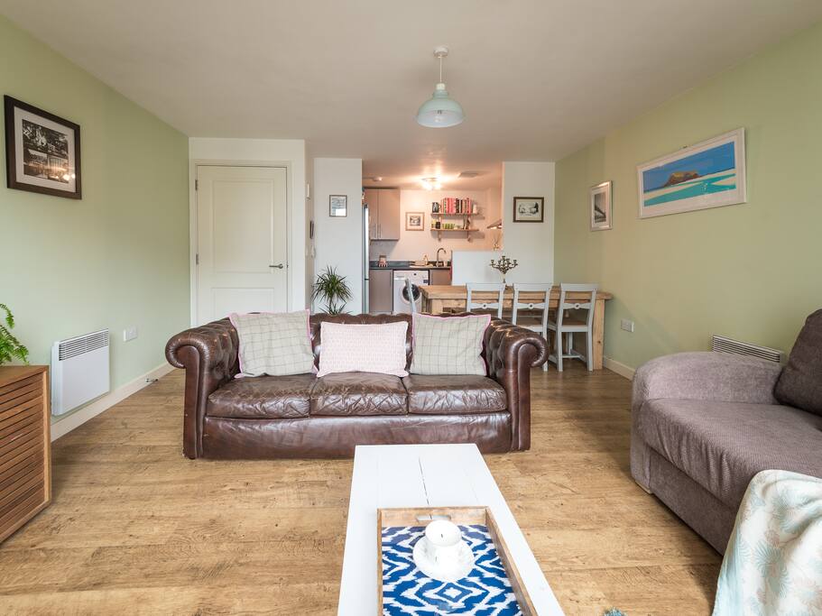 The living area is a bright and comfy space in which to relax