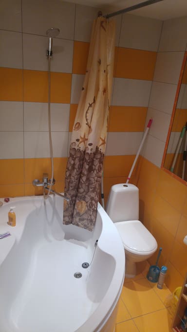 Bathroom with a shower and a bath