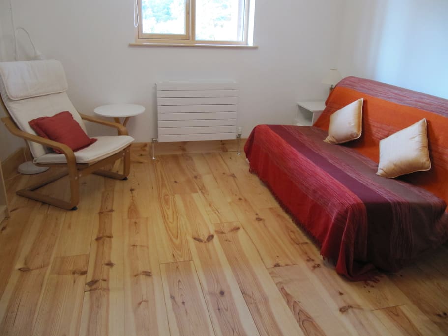 This is how the room looks when the bed is folded into a sofa.