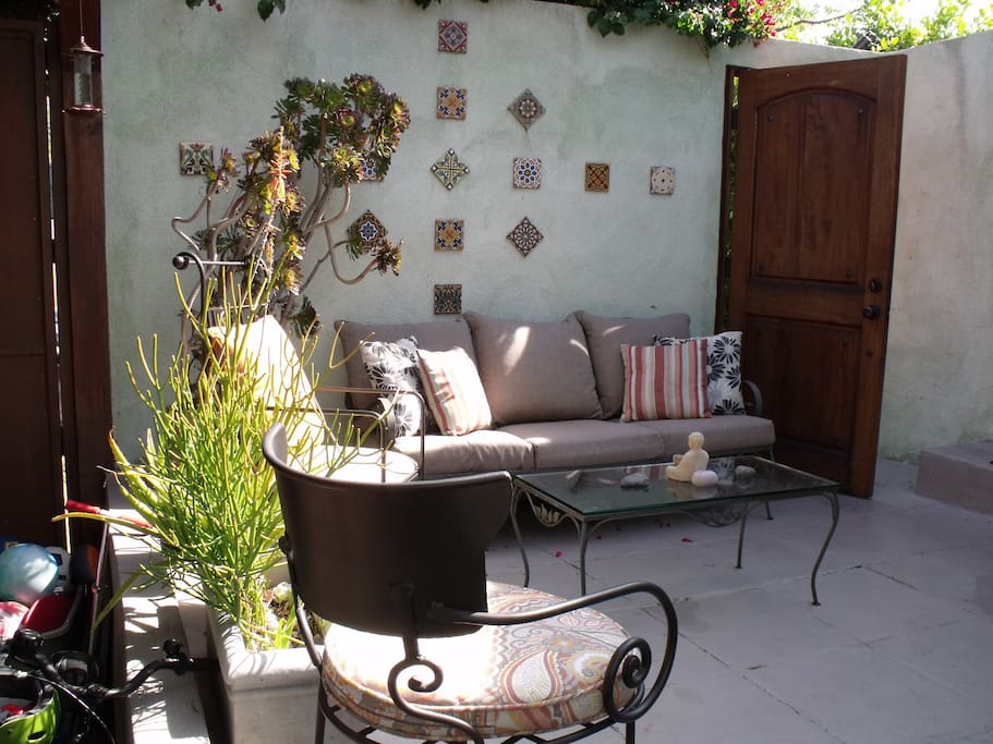 One of the patio seating areas, off the main door to the living room and bedroom number 2.