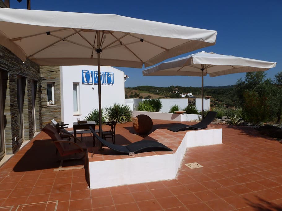 The lower terrace and sunshades