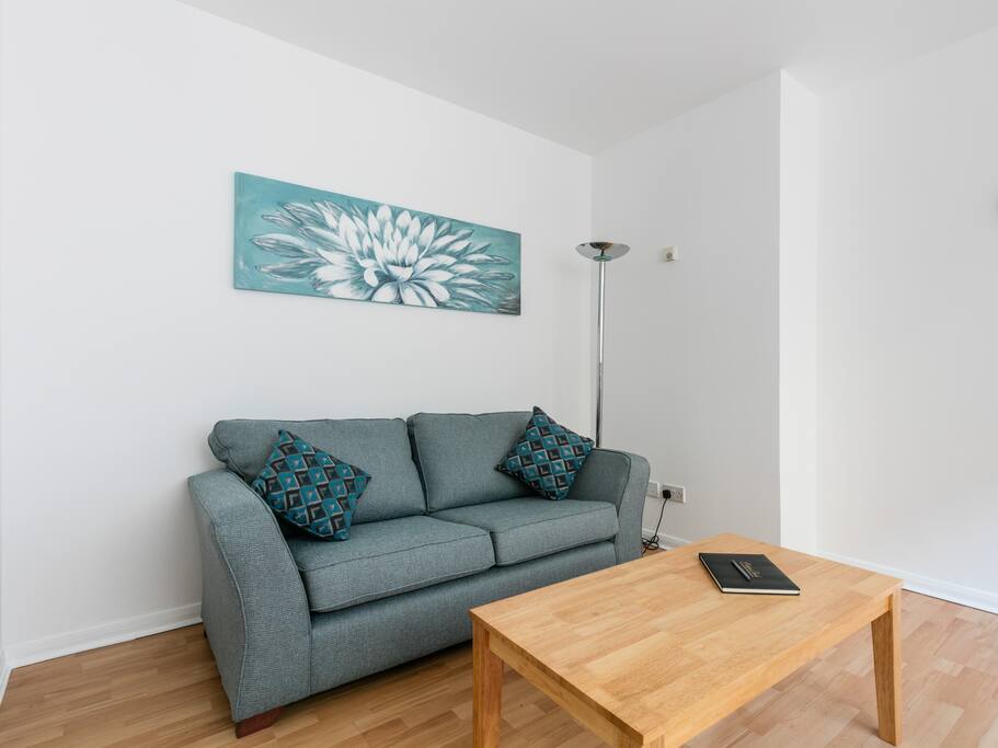 Living room area. Now comprises of a 4 seater corner sofa bed.