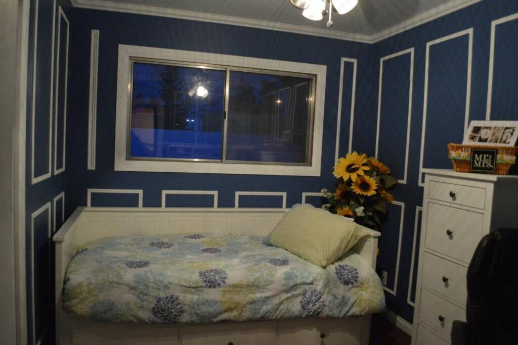 Bedroom #2 bed can convert into a Queen, has desk, and a bit of closet space for hanging clothes