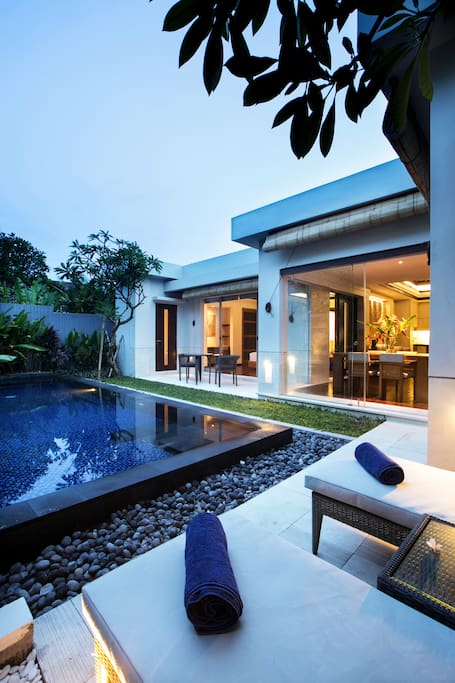 Poolside View of Villa Bedroom and Dining Room