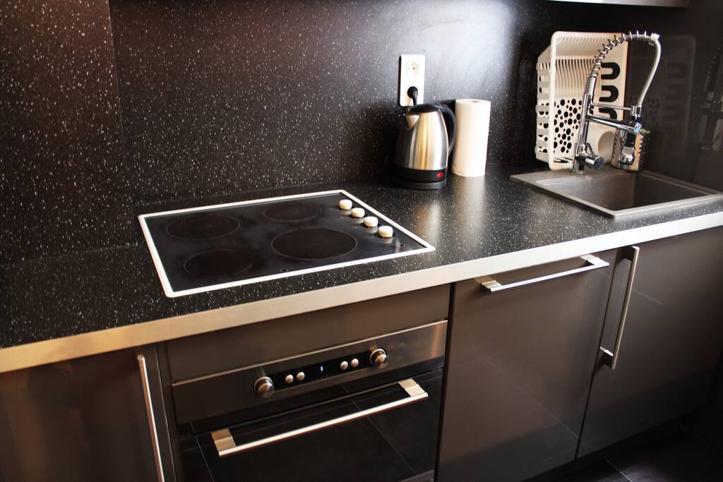 Kitchen with oven and kettle