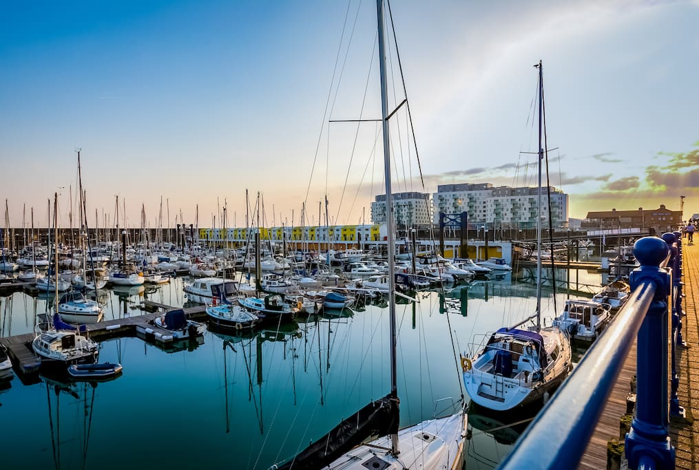 Brighton Marina at sunset, with the Rethink Living apartments in the background
