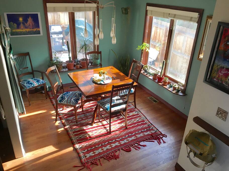 Dining room with afternoon sun and expandable table up to 8.