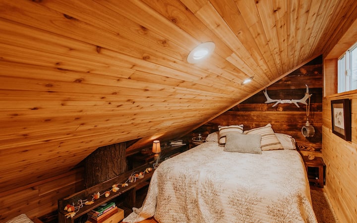 Queen size memory foam bed up in loft