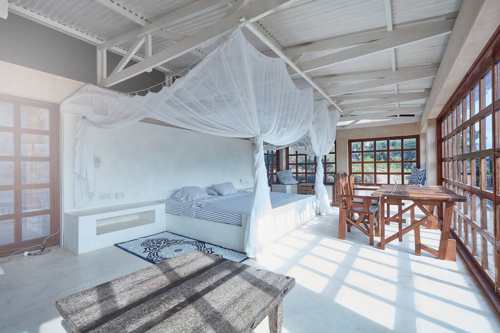 Spacious and comfy bedroom with AC