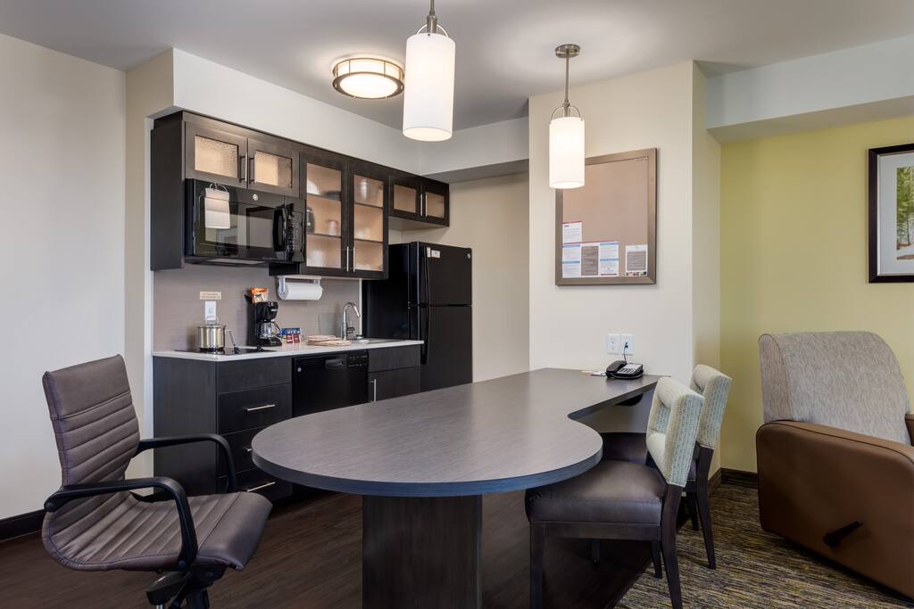 Full Kitchen (including full size fridge, microwave, dishwasher and stove top)