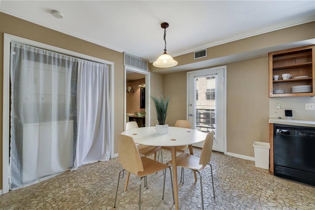 Dining area, laundry nook & Juliette balcony