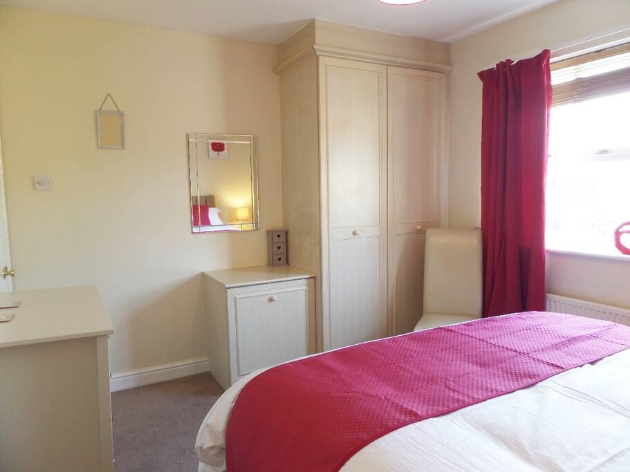 Master bedroom with fitted wardrobe